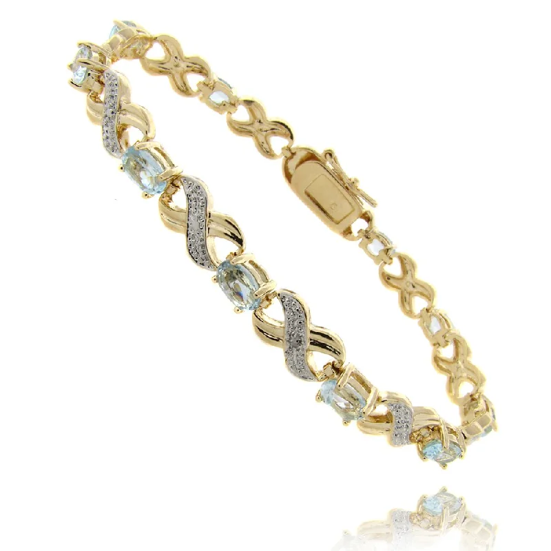 modern stellar diamond bracelet-modern stellar diamond bracelet-Summit gem bracelet-Dolce Giavonna 14k Gold Overlay Blue Topaz and Diamond 'XOXO' Bracelet